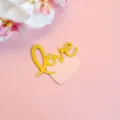 Gold acrylic love cake topper with pink heart design, perfect for Valentine's Day party decor. - Love Heart Double Layer Glitter And Gold