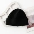 Black winter knitted beanie hat for men and women, warm thick wool cuff cap for cold weather. - Black