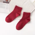 Solid red wool casual socks for women and men, breathable mid-short tube couple socks. - Crimson