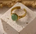 Roestvrij staal 18K goud ovalen groene edelsteen open ring, elegante verstelbare vinger detail. - Omtrek 54MM-US7 / Lichtgroen
