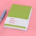 Quaderno mini diario smiley verde con pagine interne colorate e copertina carina per ufficio. - Verde