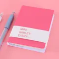 Mini blocco note diario rosa con copertina in PVC viso sorridente e pagine interne colorate - Rosso rosa