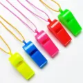 Colorful plastic whistle with lanyard, candy-color party toy whistle set for kids and events. - Whistle
