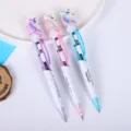 Detailed view of cute unicorn light-up ballpoint pens, smooth writing student stationery. - Unicorn