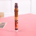 Detail shot of the quirky multi-color ballpoint pen featuring funny abstract character design. - Stick Figure