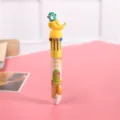 Funny cartoon monkey multicolor ballpoint pen detail view, cute student stationery item. - Monkey with Banana