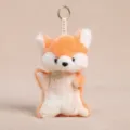 Cute plush animal keychain with orange faux fur and soft fabric star pendant for bags. - Scented Beanie Fox