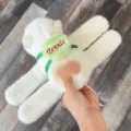 White plush slap bracelet toy with cute tennis ball design, soft stuffed animal accessory. - Ball-Back Tail-Wagging Style / 15cm / Slap Bracelet with Ball - Wagging Tail - Light Green 15cm