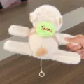 Cute capybara plush toy with tennis backpack and tail wagging feature, soft animal slap bracelet. - Slap Bracelet with Ball - Wagging Tail - Light Brown 16cm