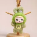 Cute green fluffy plush doll keychain with big green eyes, soft bunny ears, trendy bag pendant. - Vinyl Fruit Doll Pendant / Green