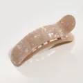 Detailed close-up of the curved acetate hair clip featuring a glossy nude marble pattern design. - Khaki