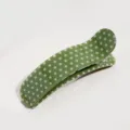 Green polka dot curved acetate hair clip detail shot, elegant daily hair styling accessory. - Green Polka Dot