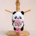 Cute panda plush keychain holding a crochet rose bouquet, soft bag charm doll accessory. - 11cm (53g) / White Panda with Purple Flower