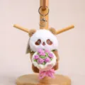 Cute plush panda keychain with handmade crochet flower bouquet, soft toy accessory for bags. - 11cm (53g) / Brown Panda with Purple Flower
