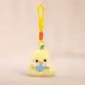 Cute yellow duck plush toy keychain with camera pendant, soft fluffy bag accessory charm. - Yellow