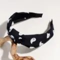 Halloween ghost printed headband detail, featuring cute ghost patterns on a wide black band. - Ghost
