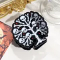 Vue détaillée de la pince à cheveux en acétate motif squelette d'Halloween et crâne. - Arbre de Squelette