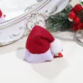 Weihnachtsmütze Haarnadel mit weißem Plüsch-Pompon, festliche süße Haarspange für Damen. - Weihnachtsmütze Haarspange