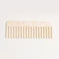 Cellulose acetate wide tooth comb detail view, anti-static hair detangling tool for long hair. - Beige