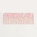 Pink tortoise acetate wide tooth hair comb detail view, anti-static detangling hair tool. - Pink