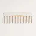 Close-up of wide tooth acetate hair comb, tortoiseshell gradient design for smooth styling. - Beige And White