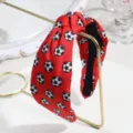 Red soccer print knotted fabric headband detail, stylish sports style wide hair accessory - Red