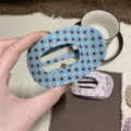 Blue polka dot oval hair claw clip sweet cute side bangs clip hair accessory detail view. - Blue Polka Dot