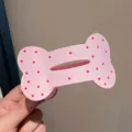 Lindo pasador de pelo en forma de hueso rosa con lunares rojos accesorio elegante diario - Rosa