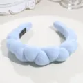Light blue puffy cloud braided sponge headband detail closeup, soft fabric for makeup washing face. - Blue