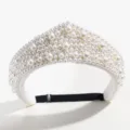 Detailed view of a retro pearl crown headband, elegant court style hair accessory with pearls. - Pearl Style / White