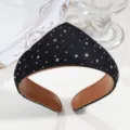 Close-up detail of black rhinestone headband with brown leather lining, elegant court style. - Rhinestone Black
