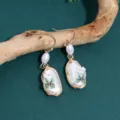 Handcrafted metal pearl butterfly earrings with unique wire-wrapped design, chic fashion jewelry for women. - Butterfly Pearl Earrings