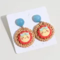 Chic woven rattan sun earrings with blue resin top, stylish cute summer beach jewelry for women. - Sun