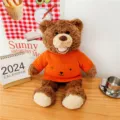 Orsacchiotto di peluche marrone con maglione lavorato a maglia arancione, morbido. - Orso Beile sorridente - Arancione / 70 cm