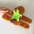 Cute capybara plush slap bracelet with a small green turtle doll, soft toy gift for kids. - Slap Bracelet Plush with Turtle on Back - Wagging Tail - Dark Brown 15cm