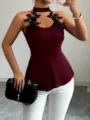 Detail of women slim halter sleeveless top with black lace cutout and peplum hem in burgundy. - S / Burgundy