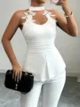 Detailed view of white halter sleeveless top with floral lace trim and peplum waist design. - S / White