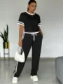 Ensemble de sport de loisirs femme t-shirt manches courtes noir pantalon rayé - XS / Hauts / Ensembles haut bicolore noir et blanc + pantalon noir