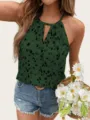 Detailed view of green halter top with abstract print, sleeveless and chic keyhole front. - Dark Green