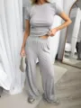 Ensemble de survêtement en tricot gris t-shirt manches courtes et pantalon pour femmes. - S / Haut et Bas / Gris clair