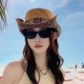 Detailed view of a stylish tribal print western cowboy hat for women outdoor sun protection. - Coffee