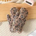 Close-up detail of soft brown leopard plush winter mittens showing cozy fluffy fabric texture. - Khaki Leopard Print Mittens