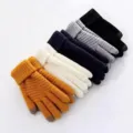 Detailed view of colorful knitted touch screen gloves closeup showcasing fine knit texture. - Woolen Touch Screen / Multicolor