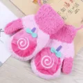 Detailed close-up of pink coral fleece kids gloves featuring cute lollipop embroidery, warm winter. - 1-5 Years / Pink Lollipop (Sound Version)