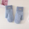 Detail view of women winter warm plush knit mittens, cute faux mink fleece soft outdoor gloves. - Sheep Logo Mitten Gloves / Blue