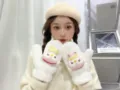 Detailed close-up of thick plush winter mittens with cute cartoon design, warm fleece lining. - Baby Penguin / White