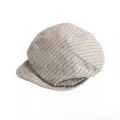 Detailed view of the striped cotton linen newsboy hat, showing fine texture and stitching. - Striped Cloud Hat / Beige