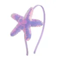 Detailed view of the sparkling sequin starfish headband featuring iridescent pink purple details. - Light Purple