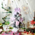 Mini desktop Christmas tree with pink bows and snow flocking for holiday home decor. - Pink 30cm