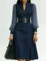 Detailed view of the denim midi dress with sheer long sleeves, stand collar and waist belt. - S / Dresses / Blue
